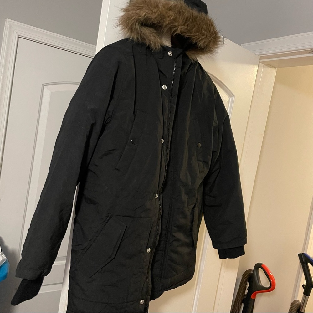 Boys winter coat with faux fur hood.